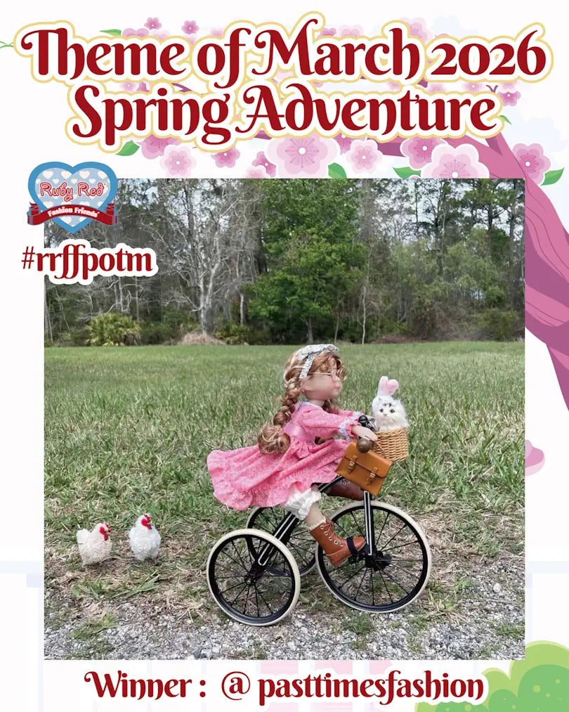 Doll in a pink dress riding a tricycle with chickens in a field, themed 'Spring Adventure' for March 2026.