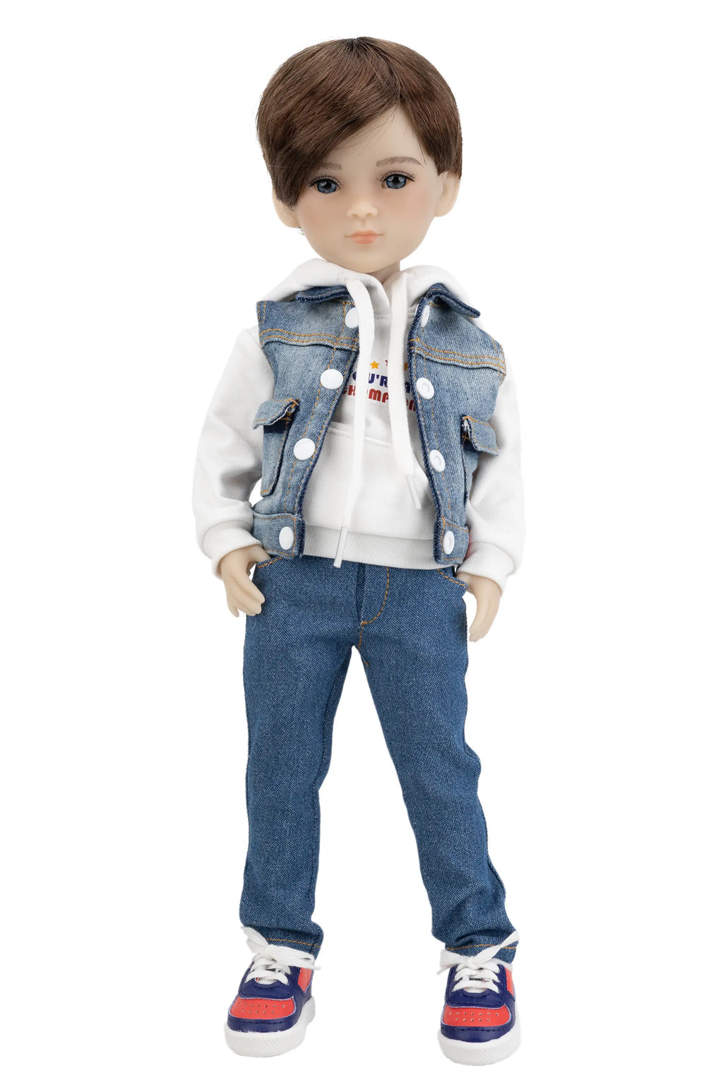 Doll wearing a denim vest, white hoodie, blue jeans, and colorful sneakers on a white background