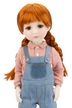Doll with red hair styled in pigtails, wearing a pink shirt and blue denim overalls on a white background.