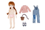 Doll with red hair and a pink outfit, accompanied by a pink shirt, blue overalls, shoes, and a bear bag on a white background.