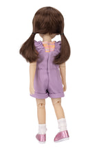 Doll wearing a purple outfit with pigtails on a white background