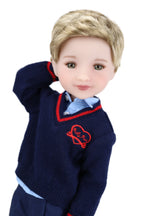 Doll wearing a navy blue sweater with a red emblem on a white background
