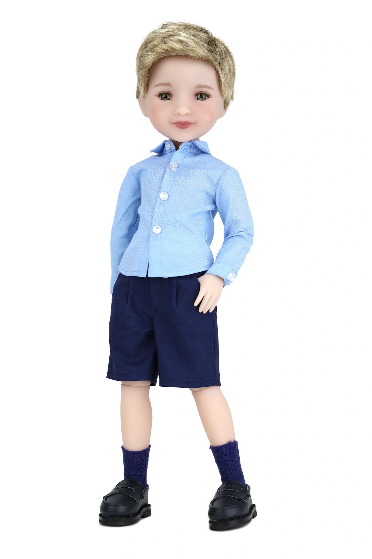 Doll wearing a blue shirt and navy shorts on a white background