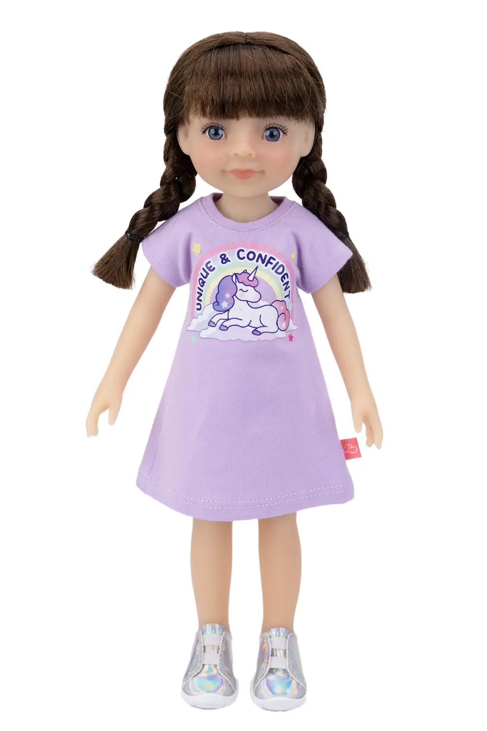 Doll wearing a purple dress with a unicorn design on a white background