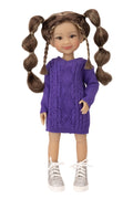 Doll wearing a purple sweater with pigtails on a white background