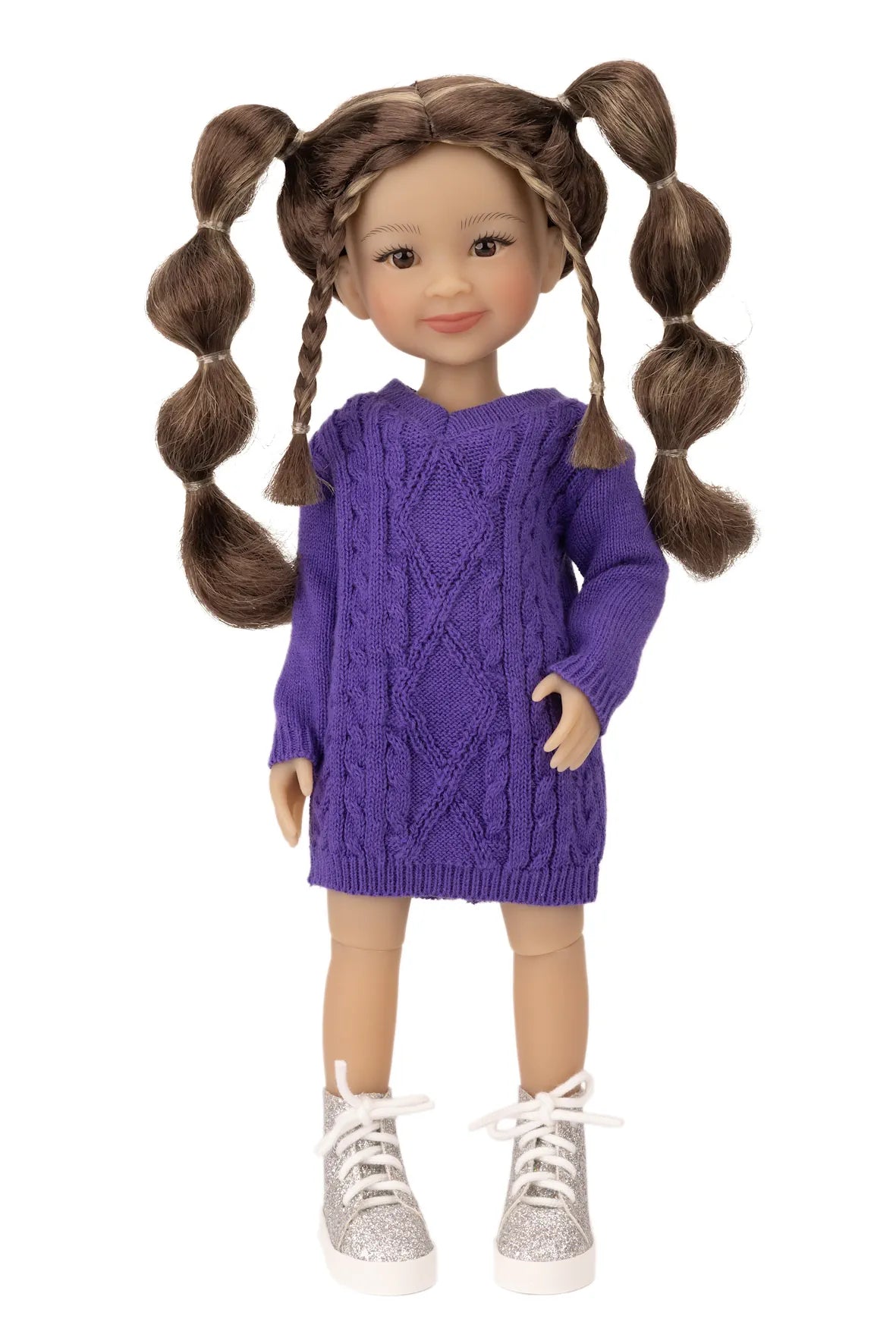 Doll wearing a purple sweater with pigtails on a white background
