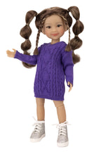 Doll wearing a purple sweater and silver sneakers on a white background