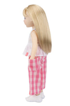 Doll wearing a white top and pink checkered pants on a white background