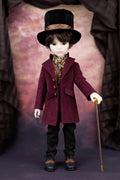 Doll in a vintage outfit with a top hat and purple coat against a draped fabric background