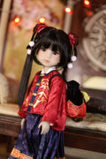 Doll wearing traditional Chinese outfit with decorative hair accessories on a blurred background
