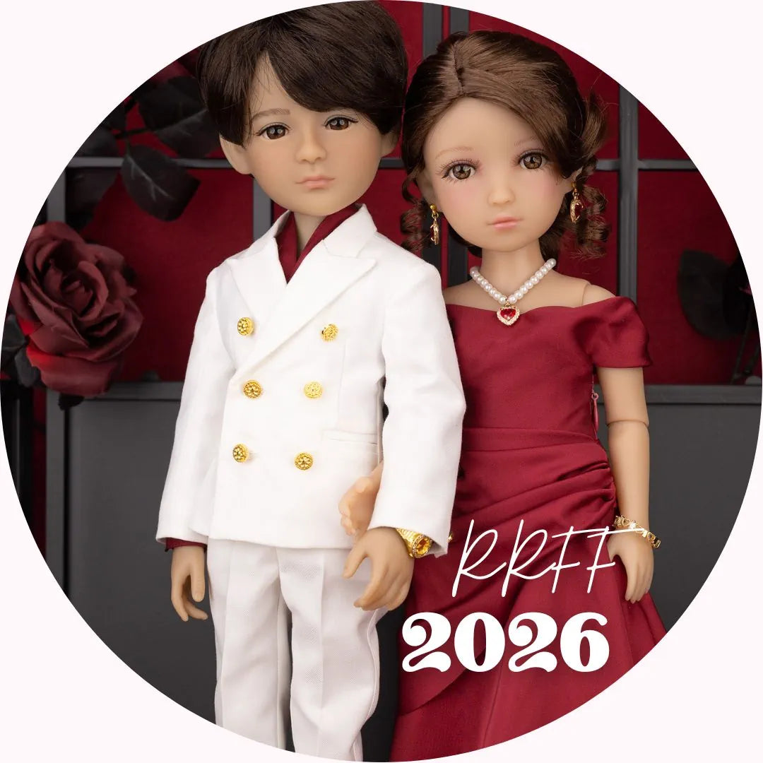 Two dolls in formal attire with a red rose and 'RRFF' 2026 text.